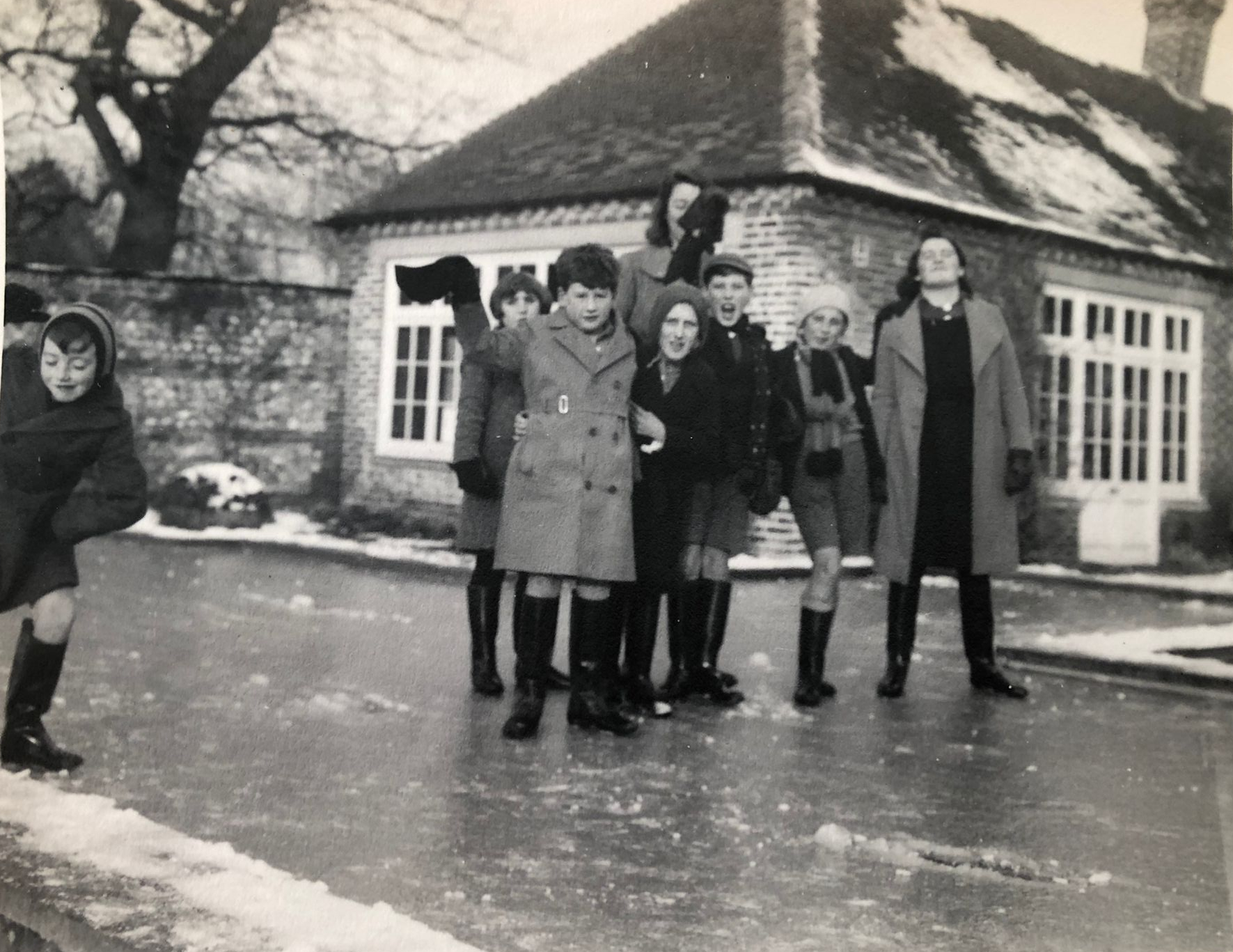 Children playing on a frozen swimming pool