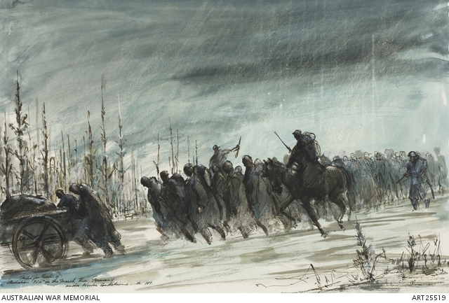 Column of prisoners of war, escorted by armed guards, two mounted, trudging through snow. At the front of the column, men are pushing a laden hand cart.