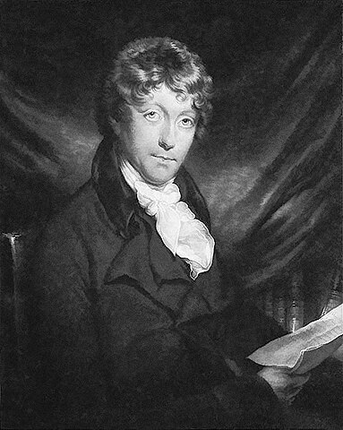 Black white engraving of a clean shaving curly haired man holding a document. He is wearing a dark jacket with a flouncy cravat of a late Georgian style