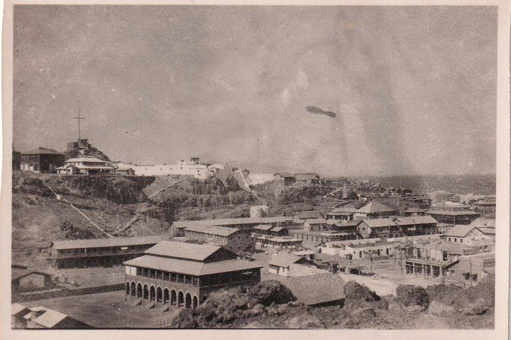 Black and white cityscape image of Aden, Yemen. The architecture suggests a blend of traditional Yemeni styles and colonial influences. c.1945