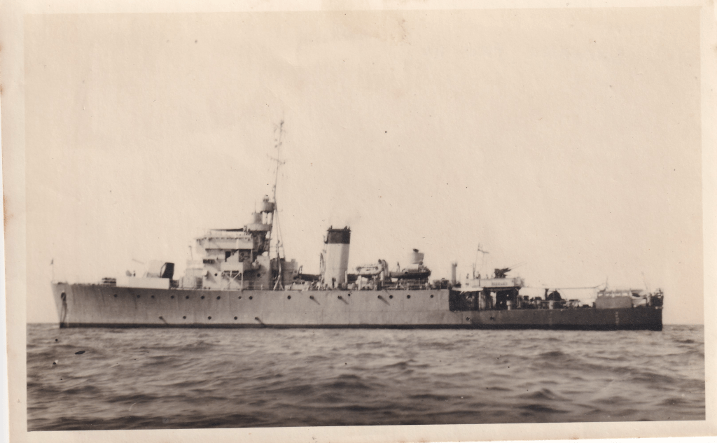 Black and white photograph of HMS Pickle (J293), a Royal Navy Algerine-class minesweeper, active in the Far East during the final phase of World War II and its aftermath.  Feb 1946