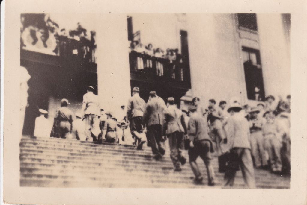 Black and white photograph showing dignitaries arriving for the formal surrender by Japanese forces in South East Asia at Singapore's Municipal Building on 12 Sep 1945