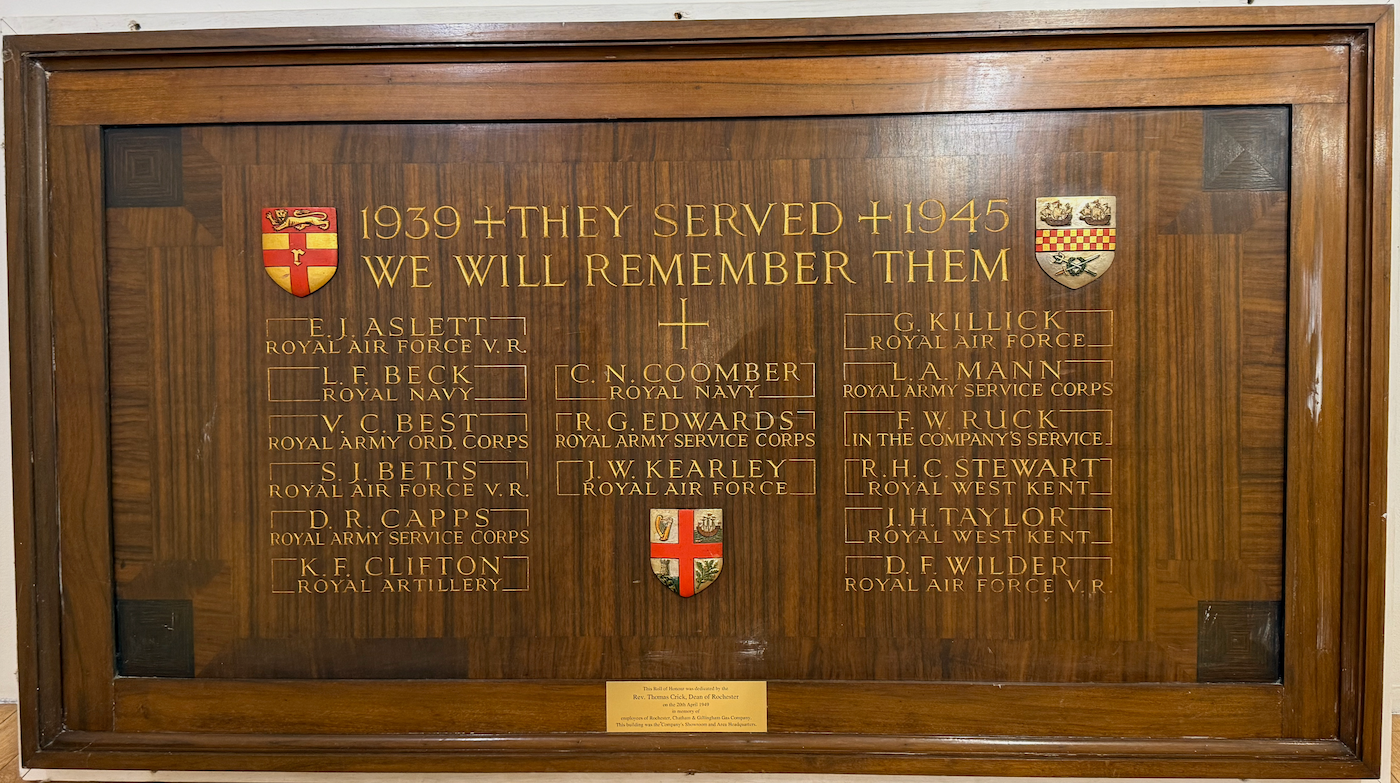 RCGGC Roll of Honour World War II memorial plaque with text listing names and military branches, titled 1939 They Served 1945 We Will Remember Them